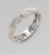 A beautiful twisted motif encrusted in pavé crystals for an exquisite design. Rhodium plated brassCrystalsDiameter, about 2¼Hinged push clasp closureImported 
