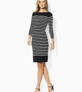 Infused with nautical inspiration, this timeless boat neck dress is finished with horizontal stripes, three quarter length sleeves and chic laced detail at the shoulders.