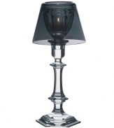 Designed by Philippe Starck for Baccarat, Our Fire candle holder combines the traditional with the modern. As in Starck's Ghost furnishings, a traditional lamp silhouette remade in crystal with a clear shade becomes something futuristic and truly luxurious.
