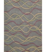 Graphic appeal: an abstract, wavy design flows across the silver field of Nourison's mesmerizing City Limits rug, giving any room a sense of urban-inspired chic. Hand-tufted of polyacrylic fibers, the rug is pleasingly soft, textured and easy to clean.