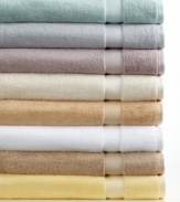 Charm your bath with comfort. This Classic bath sheet from Charisma boasts luxurious Egyptian cotton for an ultrasoft hand, offered in a spectrum of  soothing hues.