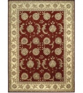 Expand beyond the standard borders of the room-size rectangle with the Nourison 2000 area rug collection. Classic in design, of the moment, while still boasting a chic sophistication, this rug features a regal ground of deepest burgundy with a tapestry-like pattern of flowers and cream border. Made of 100% silk and wool pile.