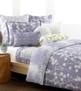 The Sakura comforter set from Style&co. presents a chic floral cut-out over soft purple with detailed green line embroidery. Digital purple droplets on the reverse create effortless charm, fit for the modern bedroom.