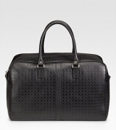 An overnight bag with detail and construction to last a lifetime, crafted in premium, gamma-embossed leather. Double handles Zip closure Interior zip pocket 18¼W X 12H X 6¾D Made in Italy