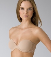 A strapless bra with molded cups and lace backing. Hook and eye closure. Comes with removable straps.