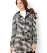 Punch up your outerwear look with this cozy houndstooth coat. The graphic pattern and chic A-line shape make it an unexpected classic!