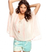 American Rag gets big on the poncho, designing the season's staple top with a soft print and classically voluminous fit!
