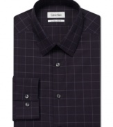 Make your mark in a classic pattern with this slim-fit no-iron checkered dress shirt from Calvin Klein.