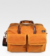 A versatile, dependable duffel is designed in a wax-impregnated canvas that combines the durability of nylon and the ease of cotton for greater strength and abrasion resistance.Zip closureTop handleAdjustable shoulder strapExterior, interior pocketsWaxed cotton canvas18W x 11H x 10DImported
