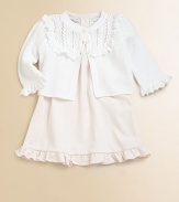 A soft pima cotton knit is lovingly adorned with lace trim, pintucked detailing and delicate rosettes for a sweet ensemble.CrewneckShort puffed sleevesButton frontLace trim around neck and cuffsRuffled hemMatching bloomersPima cottonMachine washImported Please note: Number of buttons/snaps may vary depending on size ordered. 