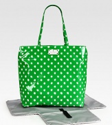 A mod, polka dot baby bag with matching changing pad for the stylish and sophisticated mom on-the-go.Double top handles, approximately 10 dropSpring clip strap top closeOne inside open pocketOne inside zip pocketWipe-clean liningPoplin-backed nylonApproximately 13½W X 12H X 10DImported