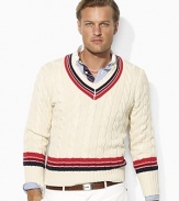 Imbued with a timeless athletic sensibility, a handsome cricket sweater is cable-knit from ultra-soft Pima cotton and accented with sporty stripes.