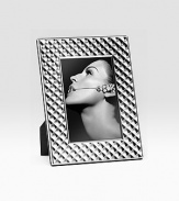 This exquisite sterling silverplate design is the perfect way to display a special 4 X 6 photo. Lacquer finish, no polishing needed Imported