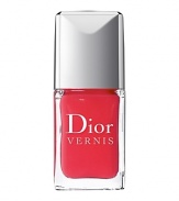 Never before has the color of Dior Vernis displayed such lacquered and vibrant shine! A cocktail of Shine and Sparkle Amplifying active ingredients directs pigments and pearly particles to enhance light reflection tenfold. Once again, the array of enchanting shades created by Tyen reflect the spirit of Dior fashion shows.Application is even easier with the brush. Dior Vernis also features a newchip-resistant formula that protects and embellishes the nails, day after day.