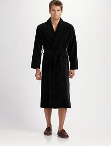 Soft luxury for the morning or bedtime in plush terry velour with a looped interior and allover stitch detail. Shawl collarTie beltWaist patch pocketsAbout 50 from shoulder to hemCottonMachine washImported