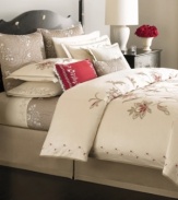 Delicate, tone-on-tone vine embroidery at the cuff brings traditional charm to soft, 100% cotton sateen in the Dreamtime Floral pillowcases from Martha Stewart Collection. Also features a smooth 300 thread count.