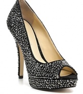 Encrusted in shimmering crystals, these dazzling pumps make a statement under spotlights and disco balls alike. From Enzo Angiolini.