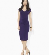 Lauren Ralph Lauren's figure-flattering jersey dress is updated with a crossover V-neckline and cap sleeves for a look that easily transitions from work to weekend.