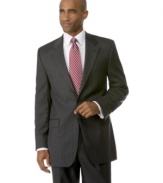 Modern style that's perfectly in-line with the classics. Wool two-button blazer features crisp, clean chalk stripes on a rich solid ground. Notch lapel. Chest welt pocket. Front flap pockets. Center-back vent.