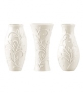 Spread elegance throughout your home with Opal Innocence Carved vases, featuring classic silhouettes with an embossed vine motif in shiny white porcelain. A pretty showcase for a couple of blooms. Qualifies for Rebate
