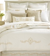 Relax in ultimate comfort with these 300-thread count Egyptian cotton Trousseau Crest pillowcases from Martha Stewart Collection.