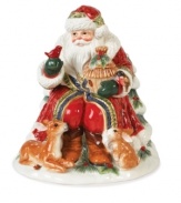 Dressed in his holiday best, woodland Santa sits surrounded by his forest friends. This collectible Santa cookie jar from Fitz and Floyd's collection of serveware makes a whimsical addition to your holiday collection.