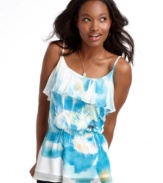 Honor your fashionista oath and commit to super cute style with this sleeveless top from BCX, where a sublimation floral print and ruffled neckline create a sublimely girlish look!