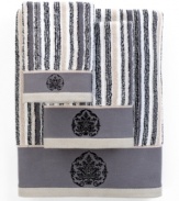 Sweet serenity. Offering a romantic and elegant composition for your bath space, this Aquarelle Embroidery hand towel features beautiful stripes in sophisticated hues. Embellished with subtle embroidery along the hem.