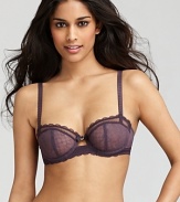 A sheer lace demi bra with vertical seam detail for uplifting results. An alluring style from Chantelle. Style #3645