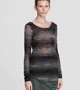 Ultra-soft in a mohair blend, this Helmut Lang sweater flaunts a striated pattern on a sheer silhouette, lending definition to staple separates.