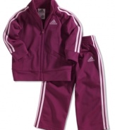 She's an all-star player. Have her learn the rules in this comfy adidas tricot jacket and pants set.