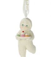 This precious Snowbaby with piercing blue eyes and rosy cheeks likes to indulge as much as you do as she carries a tray with a trio of sweet treats. Crafted of pure porcelain bisque from Department 56, this ornament is perfect for the dessert-lover.