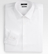 A crisp, slim-fitting classic tailored in fine cotton. ButtonfrontSpread collarCottonDry cleanImported