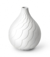 Positively dreamy, the Charade Cloud bud vase from Jonathan Adler evokes a perfect summer sky in sculpted, matte white porcelain.