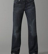 Soft Italian cotton denim in a dark blue denim with subtle fading and whiskering detail. Fading has a slight brown cast Straight-leg, relaxed fit Button fly Five-pocket style Slight distressing on pockets Signature squiggle stitching on back pockets Inseam, about 33¼ Machine wash Made in USA