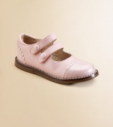 A classic silhouette with a scalloped-trim patent toe and heel and a double strap closure with decorative buttons for sweet style.Double grip-tape closureLeather upper with synthetic detailsRubber solePadded insoleLeather liningImported Please note: It is recommended that you order a ½ size smaller than measured. If your child measures a size 7.0, you may want to order a 6½. 