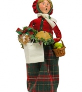Flushed from all her holiday shopping, this lovely lady juggles a doll, pie and more festive treats, all while singing beloved holiday carols. A very special figurine from the Bearing Gifts family, with the handcrafted charm of Byers' Choice.