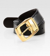 Polished, gold-plated buckle, with logo detail, adorns this reversible leather design.LeatherAbout 1¼ wideMade in Italy