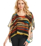 Painted in serene, Sahara-inspired colors -- and sporting a chic, asymmetrical design -- this caftan from Jessica Simpson is an easy, breezy style for balmy days.