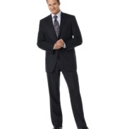 An impressive suit for the impressive man. Two-button jacket features notched lapel, two front flap pockets, two inside slit pockets and four button cuff detail. Pleated pant has back slit pockets, single back vent.