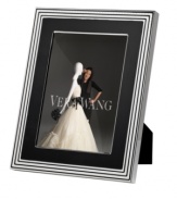 Add new elegance to beautiful memories with Vera Wang's With Love Noir picture frame. Geometric detail lends metallic shimmer to chic black enamel in a home accent that invokes modern and deco design.