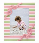 Present one of your little one's cutest, funniest or sweetest moments in this Little Girl with a Curl picture frame from Gorham. With sculpted bows and cheery pink and green stripes.