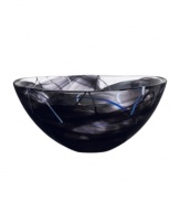 A colorful, abstract print on lead-free crystal lends your home decor modern appeal.