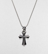 A rayskin-textured cross, crafted in sterling silver with contrasting onyx inlay. Sterling silver Onyx Pendant, about 2 long Necklace, about 20 long Imported 