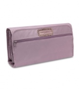 An understated design packs in true polish and sophistication for an always-smooth landing. The coordinating amethyst lining adds a lively contrast that guarantees style is always in the bag.