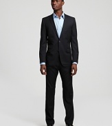 Suitable for the boardroom and the best man, this pinstripe suit in lightweight virgin wool is a wardrobe staple. Fully lined jacket has notched lapel, front flap pockets and 2-button closure. Pant has flat front, black slit pockets and zip fly.