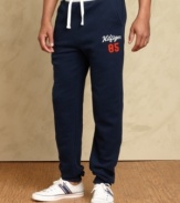 Cool casual comfort is easy to come by with these athletic pants from Tommy Hilfiger.