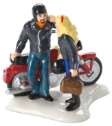 Ride on. This vibrant young couple travels in style, taking a bold red Harley to Snow Village's biggest holiday bash. A must-have figurine for bikers, from Department 56.