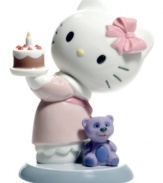 Make a wish! The Hello Kitty Happy Birthday figurine will be the icing on her cake, featuring the famous Sanrio cat in glazed porcelain from Nao by Lladro.