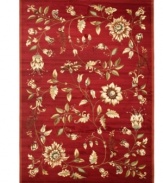 An intricate display of cascading florals creates this purely elegant Lyndhurst area rug from Safavieh. Crafted in Turkey of soft polypropylene, this rug radiates timeless allure with the added convenience of easy-care construction. (Clearance)